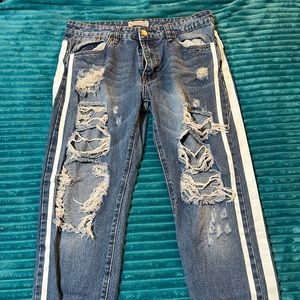 Medium ripped high rise jeans